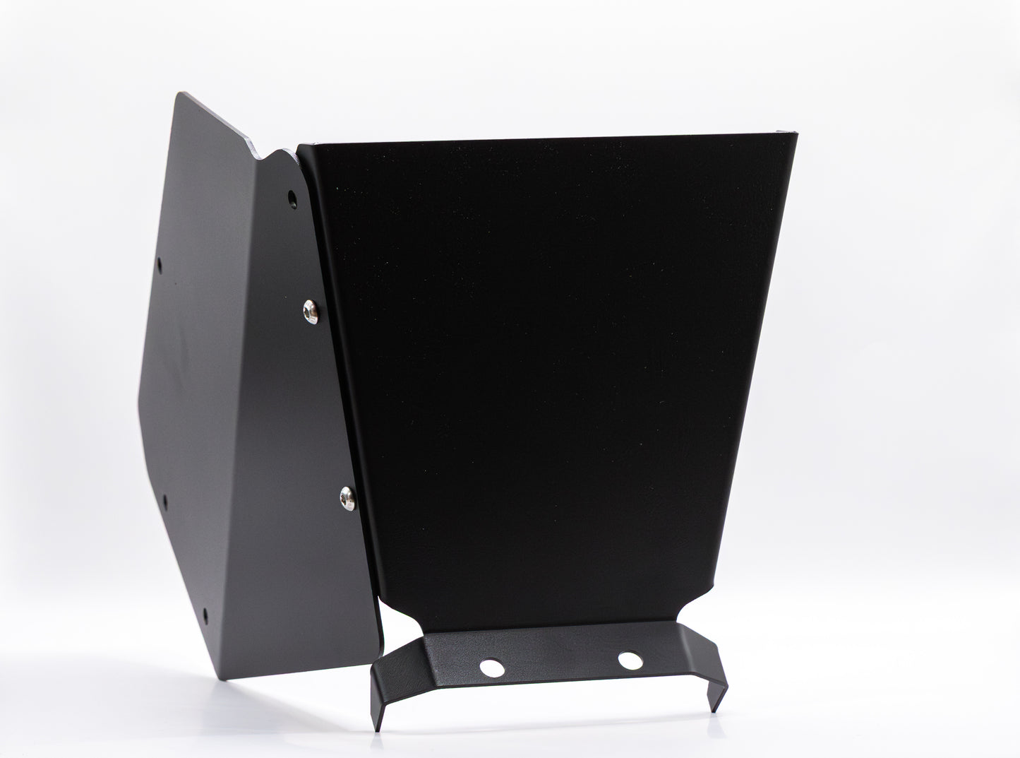 The StayFlush Clean Slate Console – Universal Blank Build Platform by StayFlush Motorsports is a black metal bracket with angular panels, mounting holes, and a matte finish, shown upright against a plain white background and secured with visible screws.
