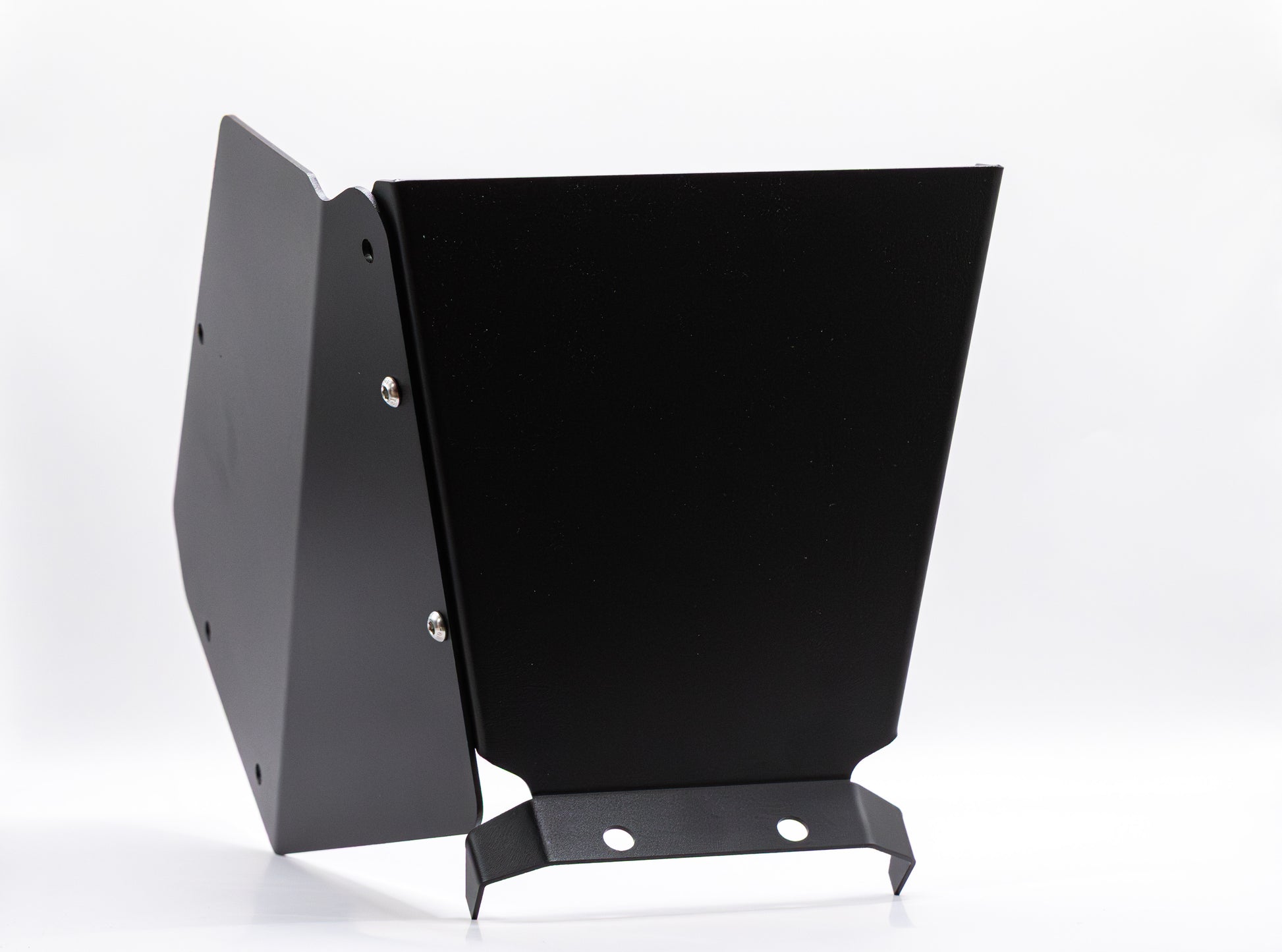 The StayFlush Clean Slate Console – Universal Blank Build Platform by StayFlush Motorsports is a black metal bracket with angular panels, mounting holes, and a matte finish, shown upright against a plain white background and secured with visible screws.