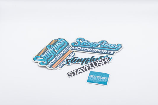 The StayFlush Motorsports Sticker Pack features high-quality stickers in various shapes, sizes, and colors, displayed on a plain white background.